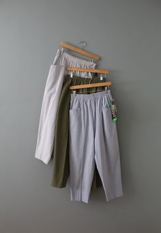 "Vintage essential high waisted minimalist baggy trousers in soft cotton blend material. Elastic waist and two large hip pockets. Comes in seersucker stripe, moss green and periwinkle blue colors. (Choose from the option below) Circa: 1990's Fits like medium (vintage size 12 petite): 30\" waist 40\" hips 37\" length 12\" rise 25\" inseam In excellent condition! (New Old Stock with tags attached)" Green And Periwinkle, Dress 80s Style, High Waist Trousers, Womens Trousers, Baggy Trousers, Periwinkle Blue, High Waisted Trousers, Moss Green, Trend Setter