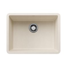 a white kitchen sink with a drain in the middle and a black faucet