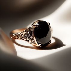 Elegant Black Signet Ring For Formal Occasions, Classic Black Onyx Rings, Elegant Black 14k Gold Signet Ring, Classic Black Engraved Promise Ring, Victorian Black Engraved Ring In 14k Gold, Victorian Black Oval Rings, Black 14k Gold Engraved Ring For Anniversary, Elegant Black Signet Ring For Anniversary, Black Fine Jewelry Signet Ring For Promise