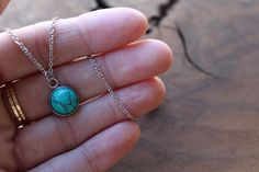 A small turquoise circle pendant hangs from a dainty, tarnish resistant silver chain. Matching earrings can be found here: https://www.etsy.com/listing/637026761/turquoise-stud-earrings-tiny-stud All metal is hypoallergenic stainless steel. Stainless steel is my preferred material for many reasons. It is low maintenance and long lasting, resistant to rust and oxidation. It also will not chip as silver and gold plated materials will. It is a sturdier, harder metal that will endure the test of tim Turquoise Nickel-free Charm Necklace As Gift, Nickel-free Turquoise Charm Necklace Gift, Nickel-free Round Turquoise Necklace Gift, Nickel Free Turquoise Charm Necklace For Gift, Minimalist Turquoise Charm Necklace For Gift, Dainty Silver Turquoise Necklace For Gift, Turquoise Circle Jewelry For Gift, Minimalist Turquoise Nickel-free Necklace, Adjustable Turquoise Necklace Gift