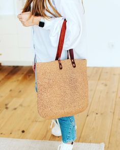 The reusable eco bag is a stylish and sustainable choice for those who value both fashion and environmental responsibility. This beach bag features a charming granny square crochet design, combining vintage aesthetics with modern practicality. Made from raffia, this shoulder bag is lightweight yet sturdy, perfect for a day at the beach, a trip to the market, or everyday use. Ideal as a gift for women, this market bag offers ample space for carrying groceries, beach essentials, or personal items. Its eco-friendly nature makes it a thoughtful gift for her, promoting a sustainable lifestyle while adding a touch of boho charm to any outfit.  Sizes: S - width - 15,7" / 40 cm, height - 13" / 33 cm M - width - 19,7" / 50 cm, height - 15,7" / 40 cm *Size S closes with 1 magnetic button, size M clo Daily Use Straw Crochet Shoulder Bag, Daily Use Crochet Straw Shoulder Bag, Crochet Shoulder Beach Bag, Beach Season Crochet Bag Made From Natural Fiber, Crochet Jute Straw Bag, Natural Fiber Crochet Bag For Beach Season, Eco-friendly Square Straw Bag For Daily Use, Square Straw Bag With Crochet For Daily Use, Summer Crochet Straw Bag For Everyday