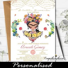 an image of a baby shower party with flowers and butterflies on the front, in gold foil