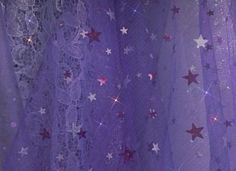 purple sheer fabric with stars and sequins