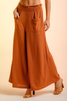 -High Waisted Rib Wide Leg Pants with Pockets-Frilled Elastic Waistband-Wide Leg Palazzo Cut-Front Pockets-Capri-Length-High-Waist95% Polyester 5% Spandex(Model height: 5'9", wearing a Small) Brown Bottoms With Elastic Waistband And Loosely Fitted Hips, Chic Ribbed Bottoms With Relaxed Fit, Chic Ribbed Relaxed Fit Bottoms, Chic Relaxed Fit Ribbed Bottoms, Loosely Fitted Brown Bottoms With Elastic Waistband, Brown Trousers With Elastic Waistband, Non-stretch Bottoms With Side Pockets For Loungewear, Ribbed Stretch Wide Leg Bottoms, Non-stretch Pants With Elastic Waistband For Fall