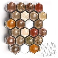 an assortment of spices arranged in hexagonal shapes