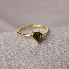 Peridot stone is believed to be auspicious among couples. Peridot is the birthstone for those born in August. We crowned the heart symbol, which is a symbol of love, friendship and many other affections, with precious stones. Now you can see the love at your finger. Other Products Compatible with Our Peridot Heart Ring: https://artdiamonds.etsy.com/listing/1390855208/peridot-heart-necklace14k-solid-gold?utm_source=Copy&utm_medium=ListingManager&utm_campaign=Share&utm_term=so.lmsm&share_time=1692099599065 https://artdiamonds.etsy.com/listing/1545013347/14k-solid-gold-peridot-heart?utm_source=Copy&utm_medium=ListingManager&utm_campaign=Share&utm_term=so.lmsm&share_time=1692107063699 F E A T U R E S * Made to Order. * Gold KT: 14K * Gold Color: Yellow Gold, Rose Gold, White Gold * Peridot Car 14k Gold Heart Ring With Birthstone For Promise, Green Heart Ring For May Birthstone Gift, Green Heart Ring For May Birthstone Wedding, Green Heart Ring For Wedding, May Birthstone, Heart-shaped 14k Gold Birthstone Ring, Green Heart Ring For Wedding With May Birthstone, Green Heart Ring For Wedding And May Birthstone, Gold Heart Cut Gemstone Ring, Gold Ring With Gemstone In Heart Cut