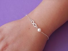 bridesmaid gift Infinity bracelet pearl bracelet bridesmaid bracelet freshwater pearl bracelet infinity bracelets infinity pearl bracelet Elegant Infinity Jewelry For Wedding, Elegant Infinity Wedding Jewelry, Pearl Bracelets For Bridesmaid Gift, Elegant Infinity Bracelets For Mother's Day, Elegant Infinity Bracelet For Mother's Day, Silver Pearl Bracelet For Bridesmaid Gift, Silver Pearl Bracelet For Bridesmaid, Minimalist Sterling Silver Pearl Bracelet For Wedding, Elegant Hypoallergenic Infinity Jewelry