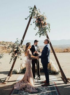 a couple getting married at their desert wedding