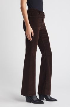 "Find FRAME Le Easy Flare Corduroy Flare Jeans on Editorialist. Stretchy corduroy in a chocolate-brown hue brings an indulgent look and feel to these full-length flare jeans. 31\" inseam; 22\" leg opening; 11\" front rise; 14 1/2\" back rise (size 29) Zip fly with button closure Five-pocket style 71% cotton, 22% rayon, 6% elasterell-p, 1% elastane Machine wash, dry flat Made in Turkey" Chic Brown Wide Leg Flare Jeans, Wide Leg Brown Flare Jeans For Work, Mid-rise Brown Flare Jeans For Fall, Brown Flare Work Pants, Fitted Brown Flare Jeans, Brown Flare Jeans For Fall, Fitted Brown Flare Jeans For Fall, Fitted Full Length Brown Flare Jeans, Brown Straight Leg Flare Jeans