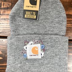 This Grey Carhartt Beanie With Hand Embroidered Flowers Is A Beautiful Addition To Any Wardrobe. The Flowers Are All Hand Embroidered By Me, So Some Variations May Occur. Embroidered Carhartt, Carhartt Beanie, Hand Embroidered Flowers, Carhartt Women, Light Crafts, Grey Beanie, Needle Point, Hand Embroidery Design, The Flowers