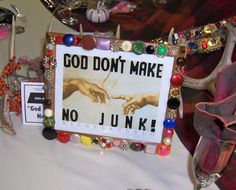 a sign that says god don't make no junk