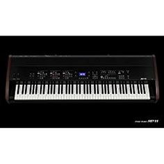 the electronic keyboard is black and white with an image of a blue light on it