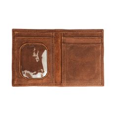 This slim bi-fold wallet is a great size for all your essential cards and a little bit of cash. Tuck it in your pants or jacket pocket for easy access to all the things you need on the go. 100% genuine leather Bi-fold, slim design Features an ID window, two card slots and two interior pockets Measures 4"H x 3"W Handcrafted in Honduras All finishes are high quality. This is a handmade leather item, and by nature, there are variations in color and markings, adding to the unique character of each i Casual Bifold Wallets With Coin Pocket, Casual Bifold Wallet With Coin Pocket, Classic Bifold Wallet With Leather Patch, Casual Rfid Blocking Bifold Card Holder, Casual Bifold Wallet With Card Slots, Casual Leather Trifold Wallet For Everyday, Everyday Bifold Card Holder With Coin Pocket, Classic Bifold Card Holder With Id Window, Classic Trifold Card Holder With Id Window