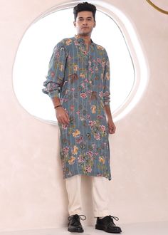 Printed kurta pant set. Spring Festive Kurta With Set-in Sleeves, Summer Straight Kurta With Set-in Sleeves, Traditional Spring Kurta With Set-in Sleeves, Eid Floral Print Tunic Kurta, Straight Kurta With Set-in Sleeves For Spring, Casual Cotton Kurta For Loungewear, Casual Dabka Kurta For Summer, Casual Summer Kurta With Dabka Details, Casual Kurta With Dabka For Spring