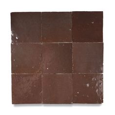 several square pieces of chocolate on a white background