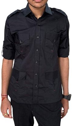 This Safari cotton black shirt is made with two buttoned chest pockets flanked by two waist pockets. Roll up tabs secure sleeves. Functional shoulder epaulettes. All shirts come in standard US sizes Made in Black color thick cotton fabric.Fit for mountaineering, hiking, traveling, camping, running and other outdoor activities Dry Clean Only: Made in India Black Long Sleeve Top With Flap Pockets, Black Shirt With Pockets For Work, Black Shirt With Flap Pockets For Work, Black Button-up Shirt With Flap Pockets, Black Workwear Shirt With Flap Pockets, Black Military Long Sleeve Tops, Black Shirt With Flap Pockets For Fall, Collared Workwear Shirt With Cargo Pockets, Black Long Sleeve Military Top