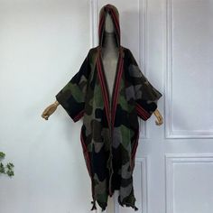 This super soft and warm wool cardigan kimono is perfect for the cold weather. Unlike other sweaters and wools, the wool used for this beauty is non itchy. Think of your favorite throw blanket, the comfort and warmth it gives but 10x stylish and wearable any where. This kimono is all that and more! One size fits S-4X Hooded Material: Wool One Size Fits Most Size Chart Warm Oversized Cardigan For Cold Weather, Fall Outdoor Wool Cardigan, Winter Soft Knit Sweater Coat One Size, Oversized Winter Sweater For Outdoors, Oversized Sweater For Winter Outdoor, Oversized Winter Sweater For Outdoor, One Size Soft Knit Sweater Coat For Winter, Oversized Warm Sweater Coat For Cold Weather, Oversized Sweater For Outdoor Winter