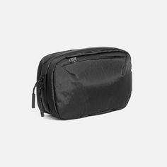 a black toilet bag on a white background