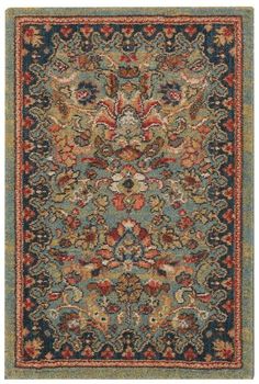 a blue and red rug with an ornate design