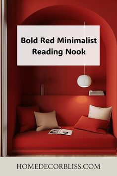 Bold red minimalist reading nook with a cushioned seat, throw pillows, and a hanging pendant light.