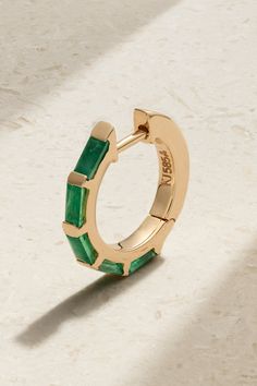 KOLOURS JEWELRY's founder Magnus Thorud is dedicated to designing pieces that allow you to express your individuality. This hoop earring is cast from 14-karat gold and set with stunning emeralds. Wear it alongside the sapphire and topaz versions in our edit. Fine Jewelry Emerald Huggie Earrings, Modern Small Hoop Jewelry With Prong Setting, Halo Huggie Earrings In 14k Gold As A Gift, 14k Gold Huggie Jewelry With Gemstones, 14k Gold Huggie Earrings With Halo For Gift, 14k Gold Huggie Earrings With Halo Detail As Gift, 14k Gold Halo Huggie Earrings As Gift, Yellow Gold Emerald Huggie Jewelry, 14k Gold Gemstone Hoop Earrings