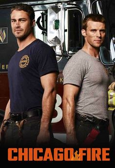 two men standing next to each other in front of a fire truck with the words chicago fire department on it