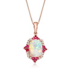 Ross-Simons - Ethiopian Opal, .20ct t. w. Ruby Pendant Necklace, Diamond Accents. 18". Like an enchanting art piece, this pendant necklace showcases an iridescent 7x9mm Ethiopian opal rectangle cabochon in a fanciful frame of .20 ct. t. w. rubies with diamond accents. Crafted in glowing 14kt rose gold. Box chain includes 2" extender. Lobster clasp, ruby and Ethiopian opal pendant necklace. Ruby birthstones are the perfect gift for July birthdays. Exquisite Oval Necklace With Large Pendant, Oval Diamond Necklace With Large Pendant, Elegant Multi-stone Oval Pendant Necklace, Multi-stone Diamond Necklace Gift, Oval Multi-stone Necklace For Wedding, Anniversary Necklace With Large Oval Pendant, White Multi-stone Pendant Necklace, White Pendant Necklace With Gemstone Accents, White Pendant Necklaces With Gemstone Accents