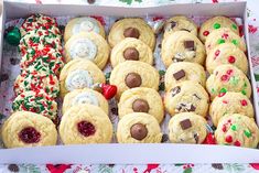 a box filled with lots of cookies on top of a table