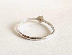 Size 9 stacking ring 4mm silver hammered circle soldered onto a 1.5mm hammered band