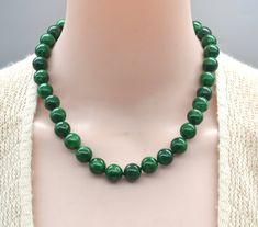 The necklace with 12mm dark green jade color: dyed dark green Necklace length: select  dark green Jade beads necklace,round, dark green Jade beads,12mm Jade beads, gemstone Wedding Jewelry,gift,big bead necklace,choker necklace The necklace will come in a beautiful gift box. I will provide a gift box for each jewelry. If you have any questions, Please feel free to contact me. Cheap Polished Jade Beaded Necklace, Big Bead Necklace, Red Agate Necklace, Chunky Turquoise Necklace, Pink Stone Necklace, Jade Bead Necklace, Gemstone Wedding, Jade Color, Diy Collier