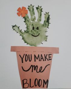 a paper cut out of a cactus with the words you make me bloom on it