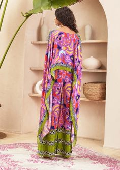 Introducing the co-ord set, where contemporary design meets meticulous detailing. The straight pants are adorned with a carefully placed border, adding a subtle yet stylish touch. The kaftan-style ... Bohemian Maxi Sets With Printed Motifs, Multicolor Maxi Length Digital Print Sets, Summer Sets With Printed Motifs And Maxi Length, Printed Tunic Sets For Summer, Bohemian Printed Tunic Set, Summer Printed Tunic Sets, Bohemian Viscose Sets For Summer, Bohemian Viscose Summer Sets, Summer Multicolor Viscose Set