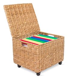 a wicker storage box on wheels with colored folders in the bottom drawer and lid