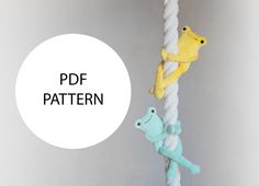 two stuffed animals on a rope with the text pdf pattern