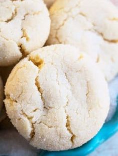 some cookies are sitting on a blue plate