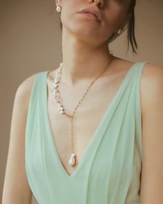 "Pearl Lasso Necklace / Pearl Y Necklace / Bridesmaid Gifts / Dainty Necklace / Unique gifts, Birthday gifts Ready to Ship Experience a minimal and modern look effortlessly with this freshwater pearl necklace. The white leaf pearl and chain are combined. If you want, you can use it as a wrap bracelet. It makes a great everyday necklace and is also perfect for layering. They can wear it during and after your wedding. It will be a unique handmade gift for your loved ones or yourself. Each item is Minimalist Pearl Drop Necklaces For Party, Minimalist Pearl Drop Necklace For Party, Modern Single Strand Necklace As Gift, Chic Lariat Necklace For Wedding, Modern Single Strand Necklace For Gift, Modern Pearl Pendant Necklace For Wedding, Elegant Single Strand Drop Necklace Gift, Single Strand Drop Necklace As Gift, Birthday Gift Photo