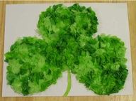 a green leafed tree made out of tissue paper