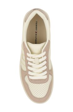 Breathable perforations and signature logo accents lend street-savvy appeal to a low-profile sneaker grounded by a durable cupsole. Synthetic upper/textile lining/synthetic sole Imported Signature Logo, Low Profile, Womens Sneakers, Tommy Hilfiger, Nordstrom, Luxury Fashion, Sneakers