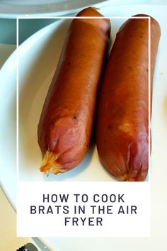 two hot dogs on a plate with the words how to cook brats in the air fryer