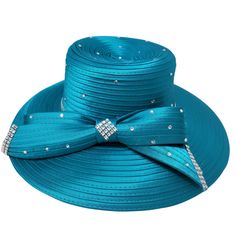 Lady Diane Collection Style: SA-075431 Color: Turquoise All season dressy ribbon hat. Features satin band around the crown. Rhinestone studs and rhinestone brooch accents. Size: Head Circumference 22 1/2" / Brim width 3" / Crown depth 5" / Diameter 13.5" Great for special occasions, weddings, conventions, holidays and for church. Extravagant Wedding Cakes, Church Lady Hats, Dressy Hats, Extravagant Wedding, Church Hat, Elegant Hats, Fancy Hats, Church Hats, Color Turquoise