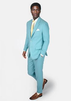 The vibrant linen cotton blend of the Astor Capri Blue Linen Suit will have you embracing the summer heat in comfort and confidence. Custom made and a guaranteed way to upgrading your wardrobe with a stylish, statement piece. Tailored Solid Suits For Summer, Summer Solid Suits With Notch Lapel, Solid Summer Suits With Notch Lapel, Solid Notch Lapel Summer Suit, Summer Solid Color Notch Lapel Suits, Tailored Summer Suits With Welt Pockets, Tailored Summer Suits For Business Casual, Slim Fit Summer Suits With Notch Lapel, Summer Slim Fit Suit With Notch Lapel