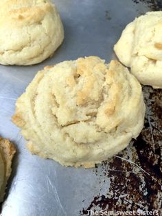 some cookies are sitting on a baking sheet