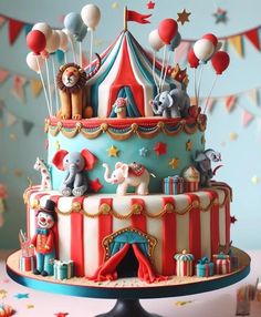 a circus themed cake with balloons and animals on top