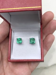 A classic pair of Asscher-cut green natural Colombian emerald gold studs 14K white gold. These earrings feature two lively, natural Colombian emeralds that are handset in a single four-prong setting. These stones were sourced by the best emerald mine in the world known as Chivor. They are comfortable to wear and come with secure back pieces. (Exceptional in color and style!) No two emeralds are perfectly alike, one emerald is slightly larger than the other. Embrace uniqueness :D Setting Style: S Luxury Emerald Earrings In Emerald Cut, Fine Jewelry Cushion Cut Gemstone Earrings, Cushion Cut Gemstone Earrings In Fine Jewelry Style, Cushion Cut Gemstone Earrings Fine Jewelry, Cushion Cut Gemstone Earrings For Fine Jewelry, Classic Emerald Jewelry Hallmarked, Classic Hallmarked Emerald Jewelry, Classic Emerald Jewelry With Diamond Cut, Gia Certified Emerald Earrings For Formal Occasions