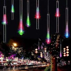 many colorful lights are hanging in the air