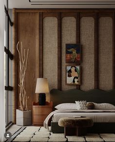 a large bed sitting next to a tall window in a room with wooden paneling