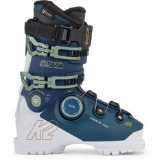 a pair of ski boots with white and blue soles