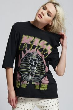 Secure a spot in the Rock and Roll Hall of Fame and wear some music history in our KISS Hot In The Shade Tour tee. The Hot in the Shade Tour (also dubbed as the H.I.T.S. Tour) was a North American concert tour by KISS. The details speak for itself; from the iconic KISS logo to the legendary graphics from the 1990 tour, we got you covered. All on a soft cotton fabric with a crew neckline, oversized sleeves, and fit, made to feel and look like the perfect relaxed old school tee. Details Style #301 Kiss Logo, Oversize Sleeves, School Tees, Boyfriend T Shirt, Music History, Rock And Roll, Vintage Inspired, Graphic Sweatshirt, Cotton Fabric