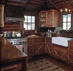 a kitchen with wooden cabinets and an island in front of the sink, stove top oven and dishwasher