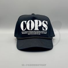 "80s/90s Retro Vintage Unworn Black Trucker Rope Snapback Hat w/ COPS TV Show Logo \"COPS Hat\" * Black * One Size Fits Most * 5-Panel Cotton Twill * High Profile, 3 3/4\" Structured Crown * Cotton Twill * Retro Rope * Snapback Closure **We try to provide every angle in the pictures so please read the description carefully of product listing, size, & fit description & measurements. Also please ask any questions about sizing prior to ordering if you are concerned. Follow us on IG for new items & Vintage Short Brim Snapback Hat For Streetwear, Vintage Baseball Cap With Short Brim For Streetwear, Vintage Black Dad Hat For Streetwear, Vintage Short Brim Baseball Cap For Streetwear, 90s Style Adjustable Baseball Cap With Curved Brim, Retro Snapback Hat With Short Brim For Streetwear, Retro Short Brim Snapback Hat For Streetwear, 90s Style Adjustable Curved Brim Baseball Cap, 90s Curved Brim Streetwear Hat